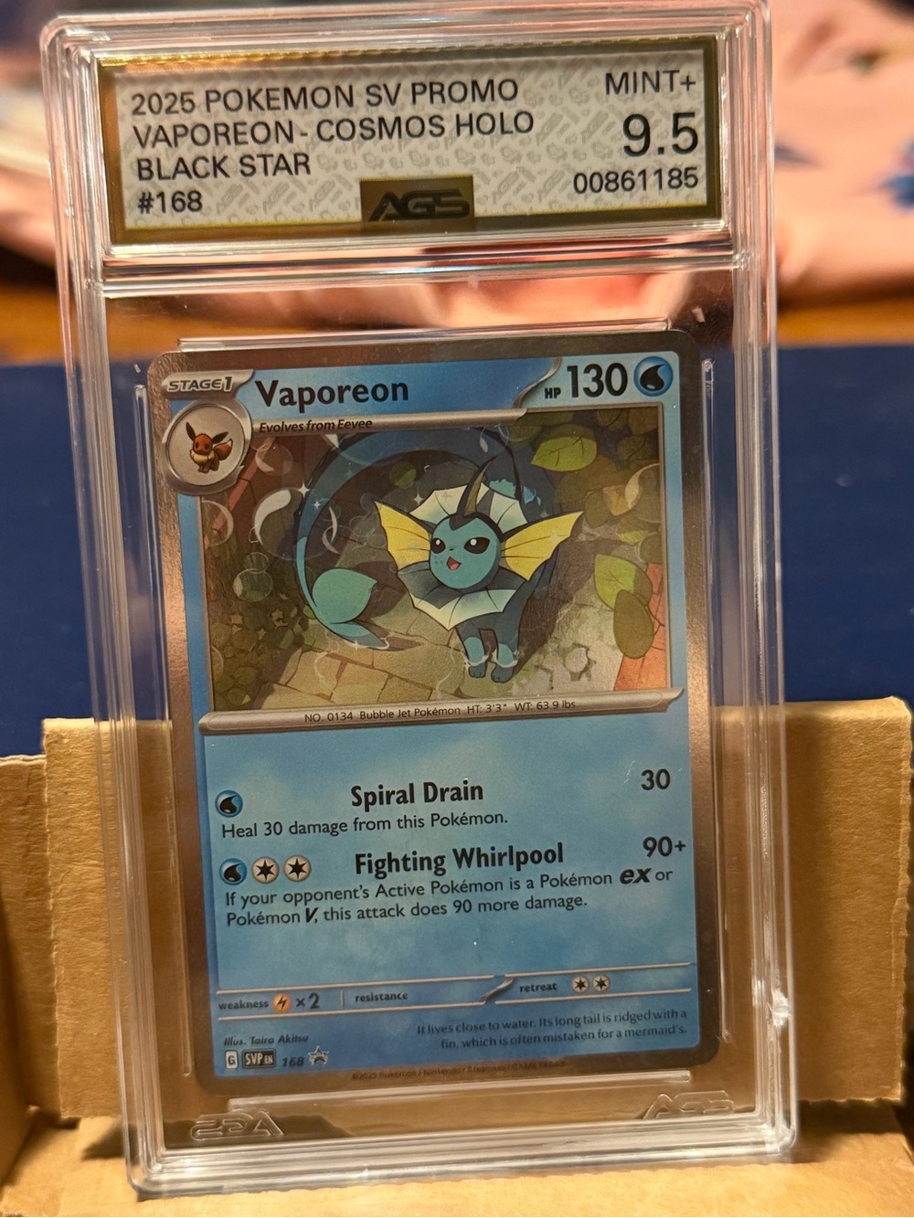 Pokemon Vaporeon Cosmos Holo Card - Blue and Teal